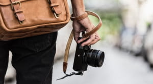 Man carrying camera